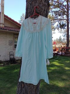 "A New Floral Nightgown Barbizon Brand blue Size medium New with tags Original Price tag $55 pit to pit  20\" PIt to bottom: 29\" Shoulder to bottom: 39\"   Thanks for looking and please keep checking our store for updates.  We update weekly adding new items. Our items come from a smoke free and pet free environment." Light Blue Cotton Sleepwear, Light Blue Cotton Sleepwear For Home, Blue Long Sleeve Dress For Pajama Party, Light Blue Long Sleeve Nightgown For Sleep, Light Blue Long Sleeve Nightgown, Light Blue Long Sleeve Nightgown For Bedtime, Vintage Blue Nightgown For Hospital, Light Blue Cotton Nightgown For Loungewear, Blue Nightgown For Spring Loungewear