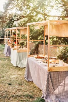 a table with food on it in the grass