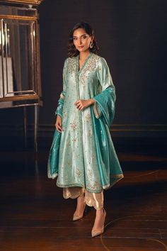 This statement sea green shir has stunning hand worked embroidery and colorful hand resham work in hues of gold. The piece is paired with tissue culottes with scalloped hand work embroidery and a fully Hand worked dupatta. ✨This outfit is perfect of any festive party, wedding function  ✨If you want any changes in the outfit please contact us. This dress can be customise in any other colour and in all size.We will make this dress as per your choice. ✨There may be slight colour difference due to high quality camera resolution and other filters.  🌸Care Instruction Dry clean only Zuri Aesthetic, Eastern Wear, Suit Indian, Pearl Work, Resham Work, Embroidered Anarkali, Suit Ideas, Pakistani Suit, Dresses Design