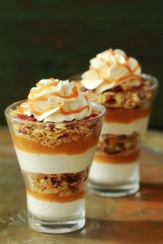 three small desserts are sitting on a table