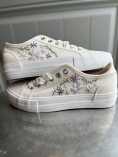 Hand embroidered floral sneakers. Perfect for a wedding, bachelorette, bridal shower, or for an every day sneaker with a little flare! Embroidered Wedding Sneakers, Embroidered Tennis Shoes, Embroidered Sneakers For Wedding, Spring Floral Embroidered Round Toe Sneakers, Low-top Embroidered Canvas Shoes For Spring, Spring Low-top Canvas Shoes With Embroidered Logo, Spring Lace-up Sneakers With Embroidered Logo, Low-top Canvas Shoes With Embroidered Logo For Spring, Wedding Low-top Sneakers With Floral Embroidery