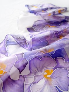 Silk scarf Pansy is a hand painted silk scarves, decorated with purple flowers on a white - purple background. Size: 49 by 11 in (130 by 28 cm) Silk: natural Habotai Light (very soft, delicate, semi transparent and bit glossy) Pansy scarf was designed and hand painted by me. It is a spring scarf, both in silk type (very delicate natural Habotai) and in style (pansies are the most gorgeous spring flowers). This violet scarf will make a gorgeous gift for the Mother's Day. This silk scarf is made t Purple Silk Scarves With Floral Print, Purple Silk Scarves For Spring, Purple Silk Scarf With Floral Print For Spring, Purple Floral Print Silk Scarf For Spring, Artistic Purple Silk Scarves, Artistic Purple Silk Scarf, Lilac Scarf, Scarf Painting, Painted Silk Scarves