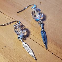 2½ Inch Long Feather Earrings. These Earrings Are Hand Crafted On Silvertone Metal Findings With Recycled Crystals Finished With Silvertone Metal Feather Charms $10.00 +S&H #Countrygypsyor Metal Feather, Feather Charms, Feather Earrings, Earrings Color, Crystal Earrings, Silver Tone, Hand Crafted, Jewelry Earrings, Charms