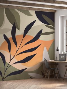 a dining room wall decorated with an orange and black floral design on the wall, next to a window