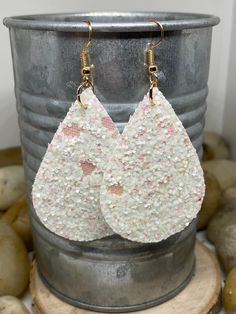 "Glitter faux leather teardrop earrings measuring Aprox 2\" for large or 1.5\" for mini in a variety of options. All color options can be made in to mini or large size and you can request a specific hook color if you'd like something other than what's pictured. Available in gold, silver, bronze and black. White iridescent chunky glitter with gold hooks Navy chunky glitter with silver hooks Red white blue chunky glitter with silver hooks Silver chunky glitter with silver hooks Royal blue and whit Polka Dot Earrings, Gold Hooks, Rabbit Earrings, Chevron Earrings, Easter Earrings, Bunny Earrings, Yellow Polka Dot, Turquoise Leather, Glitter Earrings