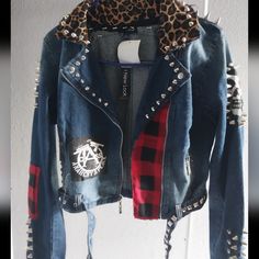 Women Punk Jacket Custom Women's Motor Denim Punk Rock Jacket Condition: Never Worn Material: Denim Size:M (Junior) All Band Patches And Patterns Are Sewn Manually. They Are, In My Opinion, Binded Securely. Every Stud And Spikes Are Applied Manually, Too. I Also Sewn Fabric Padding To Prevent Injury From The Studs I Applied. The Jacket Has Two Zipper Pockets. Feel Like Badass When You Wear This Spring Rocker Outerwear With Rivets, Spring Punk Biker Jacket With Rivets, Edgy Outerwear With Rivets For Streetwear, Edgy Rivet-detailed Outerwear For Streetwear, Edgy Riveted Outerwear For Streetwear, Spring Punk Biker Jacket For Alternative Fashion, Spring Punk Style Biker Jacket For Alternative Fashion, Grunge Outerwear With Rivets For Alternative Fashion, Fall Streetwear Biker Jacket With Rivets