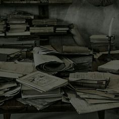 a pile of books sitting on top of a table