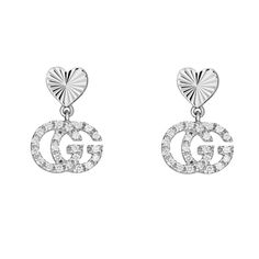 Crafted from precious white gold, these Gucci GG Running earrings pairs a contemporary House code with one of the brand's most recognizable emblems. Guccio Gucci's monogram appears as a diamond encrusted charms, paired with engraved heart studs. The combination not only pays tribute to Gucci's roots, but also connects different chapters of House history. 18k white gold 46 diamonds, totaling approximately .17 carats For pierced ears Heart studs Double G pendant with diamonds Length: .9" Made in I Gucci Monogram, Jewelry Education, Fancy Jewellery, Diamond Drop Earrings, Heart Studs, Diamond Gemstone, Wedding Ring Bands, Ear Piercings, Lab Grown Diamonds