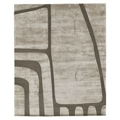 a rug with an abstract design on the front and back of it, in grey tones