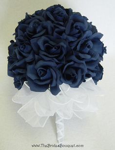 the bridal bouquet is made up of blue roses