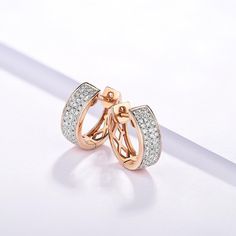 These earrings add just the right touch of glamor for any formal event. The diamond pave inlay catches the light for a dazzling effect, while the cutout design adds a touch of whimsy. You'll feel like a princess when you wear these earrings. Details Item Type: Fine Jewelry Earrings Metal Type: 14k Rose Gold Earring Size: 4.3*12.05mm Main Stone: Diamond 78pcs Diamond: 0.23 ct. t.w. Diamond Shape: Round Diamond Color: G Diamond Cut: Excellent Diamond Clarity: SI2 Back Finding: Latch Back Rose Gold Hoop Earrings With Diamond Accents For Wedding, Rose Gold Small Hoop Diamond Earrings, Rose Gold Cubic Zirconia Huggie Earrings For Anniversary, Anniversary Rose Gold Cubic Zirconia Huggie Earrings, Rose Gold Hoop Diamond Earrings For Wedding, Rose Gold Diamond Hoop Earrings With Brilliant Cut, Rose Gold Hoop Earrings With Brilliant Cut Diamonds, Rose Gold Diamond-cut Hoop Earrings, Rose Gold Hoop Earrings With Diamond Accents For Anniversary