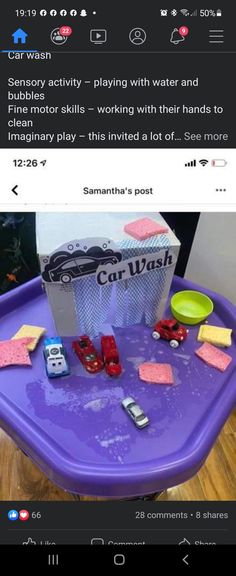 a purple table topped with lots of different types of toys and papers on top of it