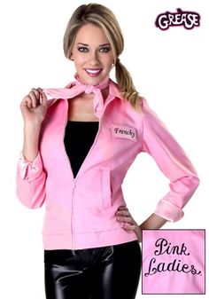 a woman is wearing a pink jacket and posing for the camera with her hands on her hips