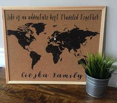 a cork board with a world map on it