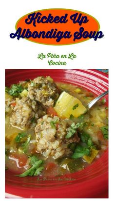 a red bowl filled with meat and vegetables next to a sign that says kicked up albondiga soup