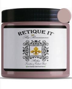 a jar of retoue it in pink and black with a white lid on top