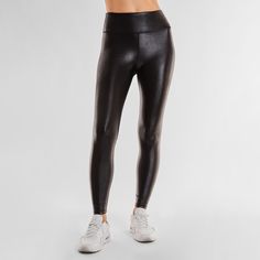 Liquid style from studio to street - meet the Liquid Legging - Black Gloss. Lightweight, lustrous shine, quick drying, and a second skin feel. Smoothing, butt-lifting and so versatile, this legging shines from workout to wear out. Made from imported Brazilian fabric: Xtra Life Lycra for resilience and longevity, this style features four-way stretch. If you fall in between sizes, we recommend sizing down. Black Liquid Leggings, Heart Pump, Athletic Build, Liquid Leggings, Black Liquid, Black Gloss, Feeling Great, Second Skin, Black Leggings