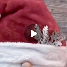 a santa hat with snow flakes on it