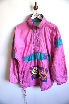 Jacket details: * Windbreaker Jacket * Zipper on front * pockets on front * Condition: Perfect vintage condition Measurements, laying flat: Length: 26/ 67 cm Armpit to armpit: 25" / 64 cm Cuff to Sleeve: 22" / 56 cm Label size: M Feel free to message me with any questions Sporty Pink Windbreaker For Outdoor Activities, Pink Sporty Windbreaker For Outdoor Activities, Pink Windbreaker For Outdoor Activities With Pockets, Pink Sporty Outerwear For Winter Sports, Sporty Pink Outerwear For Winter Sports, Pink Athleisure Windbreaker For Outdoor Activities, Retro Long Sleeve Windbreaker For Outdoor Activities, 90s Style Windbreaker For Outdoor Activities, 90s Style Long Sleeve Windbreaker For Outdoor Activities