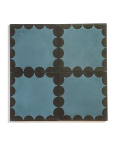 an image of blue and brown tile with circles on the bottom, in different sizes