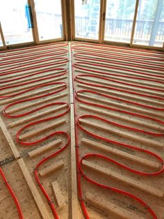 the floor is being constructed with red wires