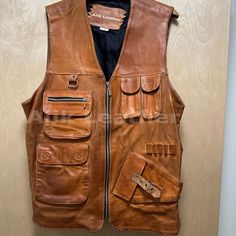 Handmade Leather Vest Vintage Brown Real Leather Vest Leather Best For Motorcycle Bikers Original Leather Vest Waistcoat for Men, Mens gifts *return policy* We do not compromise on quality and comfort. Return and Refund Policy: This item includes a 100% Money Back Guarantee! If you are not completely satisfied with your purchase for any reason, you received damaged, faulty product or you did not receive the size that you originally ordered, just send it back to our return address and we will iss Outdoor Leather Vest With Pockets, Brown Hunting Vest With Pockets, Brown Biker Vest With Pockets, Vintage Leather Vest, Biker Vest, Vest Waistcoat, Mens Vests, Custom Jacket, Leather Work