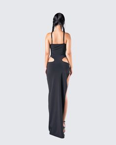 Carrie Black Cut Out Dress Fitted Maxi Dress With Cut-out Waist For Date Night, Chic Bodycon Dress With Cut-out Waist For Date Night, Elegant Long Dress With Cutout, Chic Backless Maxi Dress With Flattering Silhouette, Black Maxi Dress With Cut-out Waist For Evening, Asymmetrical Cutout Midi Dress For Night Out, Chic Sleeveless Dress With Side Cutouts, Elegant Bodycon Mini Dress With Cutout, Elegant Stretch Midi Dress With Cutout