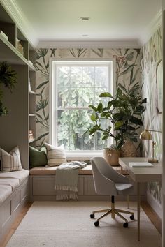 a room with a window seat, desk and plants in the corner on the windowsill