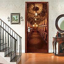 an open door leading to a hallway with stairs and a mirror on the sideboard