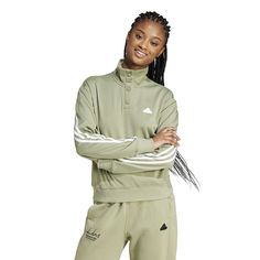 Stay comfortable and stylish when training with this Women's adidas Iconic 3-Stripe Snap Henley Track Jacket.Click on this WOMEN'S GUIDE to find the perfect fit and more! TECHNOLOGIES & FEATURES Snap henley mock neck Long sleeves Ribbed cuffs Rounded hemFIT & SIZING 21 in. from shoulder to hemFABRIC & CARE Cotton, recycled polyester Machine wash delicate ImportedRESPONSIBLE Contains recycled polyester Size: Medium. Color: Tent Green. Gender: female. Age Group: adult. Relaxed Fit Sportswear Activewear With Three Stripes, Three Stripes Relaxed Fit Activewear For Workout, Relaxed Fit Activewear For Workout, Adidas Athleisure Track Jacket For Sports, Adidas Track Jacket For Training, Adidas Sportswear Track Jacket For Training, Adidas Activewear With Ribbed Cuffs, Adidas Sporty Track Jacket For Training, Adidas Spring Activewear With Three Stripes