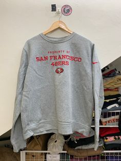 📌 BUY MORE AND SAVE MORE!! ADDITIONAL EACH ITEM $5 FOR  SHIPPING* Hi All!! May our beloved customer have a great day😁 ✅ I Just go back from thrift and found A vintage sweatshirt NFL SAN FRANCISCO TRAINING  L grey.  😻 ✅PLEASE READ THE DESCRIPTION BELOW BEFORE PURCHASING. ✅ pit 25 inch X length 27 inch length... a great vintage SF 49ers NFL sweatshirt ✅RARE AND FAST SELLING ITEm! ✅Payment Method & Shipping - Item will be ship along with Tracking Number after received a complete payment. Using F Collegiate Crew Neck Sweatshirt With Logo, College Crew Sweater With Logo Print, Collegiate Crew Sweatshirt With Logo Print, Collegiate Hoodie With Logo Print And Crew Neck, Collegiate Crew Neck Hoodie With Logo Print, College Logo Print Crew Neck Sweatshirt, Fleece Crew Sweatshirt Fan Apparel, Varsity Crew Sweatshirt With Logo Print, Crew Neck Sweats With Logo Print For College