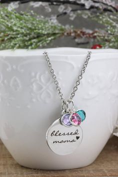 This necklaces features a stainless steel pendant that reads "blessed mama" and is accented by swarovsk birthstone crystals! It will come in either gold or silver finish, on an 18" chain.You can choose the number of Swarovski birthstone crystals from the dropdown menu, and personalize by leaving the birth MONTHS in the "optional notes to seller" area BEFORE you checkout! Adjustable Stainless Steel Necklace For Mother's Day, Mother's Day Stainless Steel Necklace For Mom, Mother's Day Gift Stainless Steel Necklace, Mother's Day Personalized Stainless Steel Jewelry, Adjustable Stainless Steel Charm Necklace For Mother's Day, Customizable Stainless Steel Necklaces As Gift For Mom, Customizable Stainless Steel Necklaces - Gift For Mom, Customizable Stainless Steel Jewelry For Mother's Day, Customizable Stainless Steel Necklace For Mom