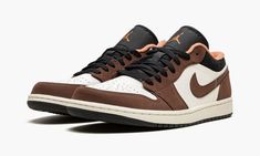 The Air Jordan 1 Low “Mocha” is a autumn-ready look for Michael Jordan’s first signature shoe that compares favorably to the brown-based design of Travis Scott’s Air Jordan 1 Low from 2019.  In no way affiliated with the hip-hop star, the “Mocha” makeup nonetheless draws plenty of inspiration from Scott’s “Cactus Jack” look with its Mocha-colored synthetic nubuck overlays and black accenting.  The perforated toe and mid-panel appear in Sail leather and a brown nubuck Swoosh is found on both side Jordan 1 Low Mocha, Logo Wings, Nike X Travis Scott, Low Air Jordan 1, Jordan Model, Nike Air Jordan 1 Low, Converse Run Star, Adidas Spezial, Jordan Sneakers