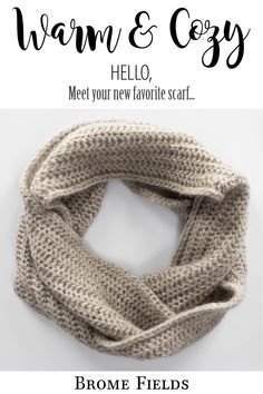 a knitted scarf with the text warm and cozy hello, meet your new favorite scarf