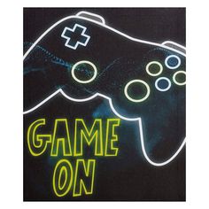 a neon sign that says game on with a video game controller