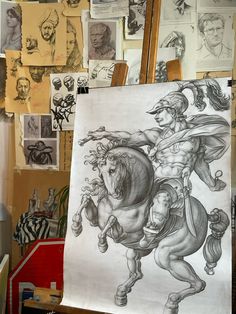 a drawing of a man riding a horse on top of a wooden easel in an art studio