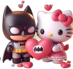 two hello kitty figurines holding a heart