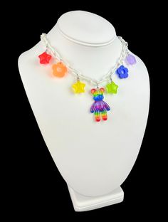 Wear a necklace that will make your inner child smile 🌈 Cosmic Drip original necklace made with cute mix and match charms and a rainbow Gummy Bear pendant! 🐻 Made with lightweight acrylic for comfortable wear Necklace is adjustable between 16-18" Made with a perfect mix of flower and star rainbow charms Gummy Bear Necklace, Fairy Festival, Original Necklace, Child Smile, Bear Necklace, Star Children, Bear Pendant, Wear Necklaces, Gummy Bear