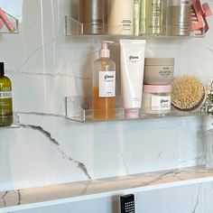 a bathroom shelf filled with different types of skin care products on it's side