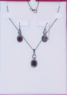 Coldwater Creek Sterling Silver Oval Garnet Pendant & Matching Earrings New in Box Dimensions: 18" Chain Length 12 mm x 9 mm Pendant 10 mm x 7 mm Earrings Great Gift!!!!! Don't miss this great Coldwater Creek jewelry set for you or for a special gal.  Buy several items and save on combined shipping. 3/4 pounds Shipping Weight Compare at $79.00 I have hundreds of unusual and discounted items. Click here to visit my store and see my other listings. BUYER'S NOTES  Prompt Shipping!! COMBINED SHIPPING: We gladly combine shipping and share the savings. If you are considering several items, contact us for a combined shipping cost. DOMESTIC US BUYERS: We DO NOT offer "Free Shipping". Buyer pays actual shipping & handling above bid amount. Combine Items and Save!! INTERNATIONAL BUYERS: We will comp Silver Oval Jewelry Sets With Matching Earrings, Oval Pendant Jewelry Set As Gift, Formal Sterling Silver Jewelry Sets With Oval Shape, Formal Oval Garnet Pendant Jewelry, Coldwater Creek, Garnet Pendant, Oval Pendant, Necklace Earring Set, Piercing Jewelry