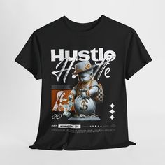 Step up your game with our Hustle Graphic Tee, designed to inspire and motivate you on your journey to success. Crafted from premium cotton fabric, this shirt offers superior comfort and durability, making it perfect for your daily hustle. Featuring a bold and stylish graphic print, it's a statement piece that speaks volumes about your work ethic and determination. Wear it proudly and let your hustle shine! Key features 💼 Inspiring "Hustle" graphic print 👕 Made from high-quality cotton fabric 😊 Soft and comfortable for all-day wear 🔥 Durable construction for long-lasting use 👌 Perfect for everyday casual wear 🎁 Great gift idea for hustlers and go-getters Hustle Design, Inspirational Graphic Tees, Message T Shirts, Zodiac Shirts, Journey To Success, Trendy Hoodies, Chic Shirts, Heart Graphic, Design Tshirt