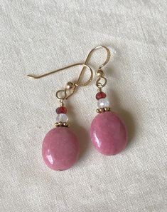 Rhodonite Garnet Moonstone Earrings, Drop Earrings, Pink Earrings, Red Earrings, Simple Earrings, Healing Stone, Gold Filled Earrings I used Rhodonite oval beads, small Rainbow Moonstone beads, tiny Garnet beads, and gold filled erring wires. Ruby Earrings With Ear Wire As Gift, Ruby Earrings With Ear Wire For Gift, Pink Natural Stone Earrings For Gift, Handmade Ruby Dangle Earrings, Oval Ruby Earrings Gift, Handmade Ruby Teardrop Earrings, Red Earrings With Natural Stones In Round Beads, Red Natural Stones Drop Earrings, Pink Ruby Drop Earrings