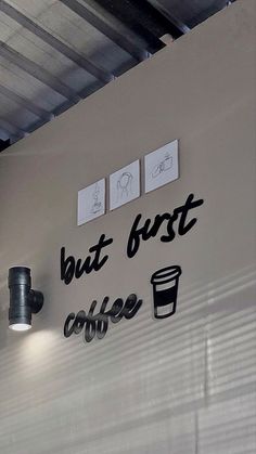 the sign on the wall says but first coffee