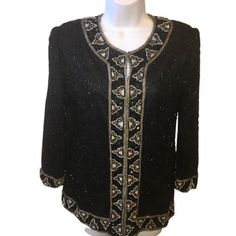 "Black silk Laurence Kazar vintage 1980's jacket, top All over beadwork in black, silver & clear beads Geometric pattern at neckline, front and cuffs Shoulder pads-tacked on, easily removed Wear open or closed with hidden hook & eyes down the front Size Small Please Measure & Compare to a garment you already have, as this jacket is vintage Armpit to armpit 20\" Shoulder to hem 25\" Note last 2 photos, small repair on shoulder seam and a few tiny pinholes in the lining, otherwise great vtg condit Elegant Beaded Festive Outerwear, Vintage Beaded Evening Outerwear, Vintage Black Embellished Outerwear, 1980s Jacket, Clear Beads, Top Vintage, 2 Photos, Black Silk, Vintage Tops