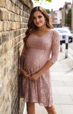 Our best-selling Freya maternity gown is now available in pretty orchid blush. Featuring the same beautiful details as before with a gentle scoop neckline and sheer detail, but in nude blush for a dreamy outfit perfect with a vintage rose sash and a wildflower in your hair. Our feminine and floaty dress in corded lace has a little stretch for extra give when taking to the dance floor and the merest sprinkle of shimmer to catch the light. Perfect for parties and blooming bridesmaids. Rose Tiffany, Maternity Dresses For Baby Shower, Salwar Neck Designs, Formal Maternity Dress, Lace Maternity Dress, Tiffany Rose, Preggo Fashion, Pregnant Wedding, Pregnant Wedding Dress