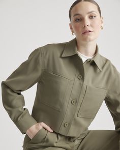 A flattering fit makes our Stretch Crepe Cropped Jacket an ideal topper whether you’re wearing a dress or looking to elevate a more casual jeans-and-a-tee ensemble. Made with recycled polyester with just the right amount of stretch it feels easy and effortless. Pairs perfectly with our Stretch Crepe Pleated Wide Leg Pant or Stretch Crepe Pleated Ankle Pant.  | Quince | Women's Stretch Crepe Cropped Jacket in Olive, Size XS, Recycled Polyester / Spandex Cropped Jacket For Spring Workwear, Khaki Long Sleeve Cropped Jacket For Work, Chic Relaxed Fit Utility Jacket For Work, Solid Cropped Outerwear For Work, Khaki Cropped Jacket For Work And Fall, Tailored Tops With Pockets For Fall, Chic Khaki Cropped Jacket For Work, Casual Fitted Cropped Jacket For Work, Fitted Casual Cropped Jacket For Work