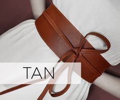 "Christmas Gift Personalised double wrap women obi belt. This sash belt is available for wedding dress or bridesmaid gift. It is vegan leather, Animal free. You can also purchase our personalized tin boxes to make an unforgettable gift. We can engrave one of our monogram on the tin box or any quote. Perfect and unforgettable gift idea for her or yourself Unique gift for anniversary, birthday or best friend gift. Gift For Her ➤ HOW TO ORDER * Choose your size from our chart and the color of the belt. * Choose the engraving options and ''+Tin'' if you want it to come with     personalization metal box. * Please put the monogram number you choose from our chart and     font number in the ''personalization'' box for Tin. - Feel free to contact me if you want your logo or have any questions. - Elegant Summer Corset Belt With Belt Included, Elegant Summer Corset Belt, Adjustable Belts As A Gift, Double Wrap Belt, Satin Outfit, Women's Sash, Belt Bow, Wide Belts For Women, Font Number