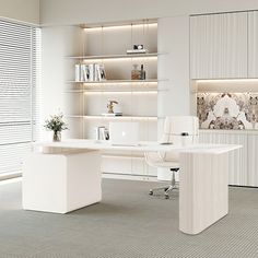 an office with white furniture and shelves filled with books