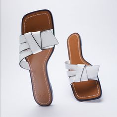 Genuine Zara New With Tag Material: Color: White Simple & Chic. Easily Goes With Most Outfits. Euro Size 38(7.5), 40(9) Trendy White Square Toe Sandals, White Closed Toe Mules For Summer, Casual White Square Toe Sandals, White Square Toe Heels For The Beach, White Square Toe Heels For Beach, White Leather Beach Mules, Chic White Flat Heel Mules, Chic White Flat Heeled Mules, White Flat Heel Chic Mules