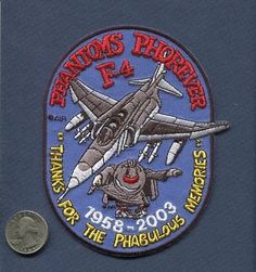 an emblem on the back of a blue book with a coin in front of it